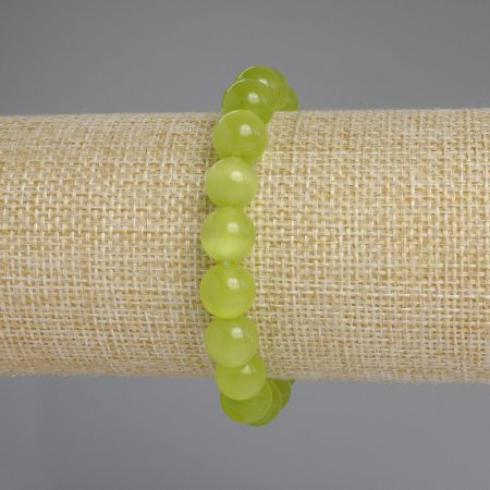Браслет Котяче око салатове кулька 9 мм стрейч
