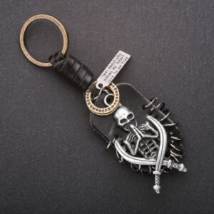 1d96d1bd-f467-408f-99a0-cd7c2c24dcf6.jpg Брелок металевий "Скелет з саблями"