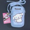1f3674dd-5a52-4313-a7cd-40356dbb26cf.jpg Сумочка для телефону/гаманець 2 в 1 "Hello Kitty/Cinnamoroll" Primark блакитна