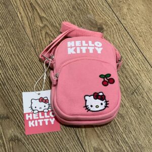 45e90273-ccc8-45c3-b39e-900da03d61be.jpg Сумочка для телефону/гаманець Primark "Hello Kitty" рожева