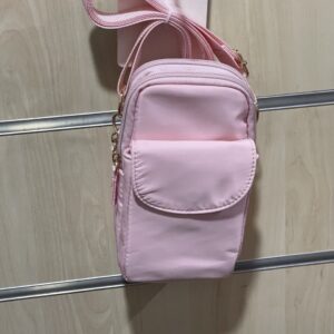 467da79d-f354-440d-a30b-b87907e06bfb.jpg Сумочка для телефону/гаманець Primark нейлонова з кишенею рожева