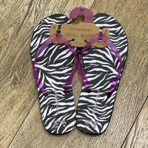 64f130d2-2287-4815-8e5f-0862fa1da063.jpg Шльопанці жіночі резинові "В'єтнамки" Primark з принтом