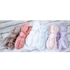 7c8605f7-2fb2-49a7-a0e2-9a7e2d7eb509.jpg Пов'язка косметична на голову "Бант з перлинами"