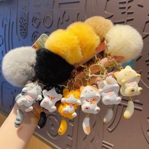 86e34b18-e382-4345-931f-a93fa50dd67f.jpg Брелок силіконовий "Котик китайський" з хутряним помпоном