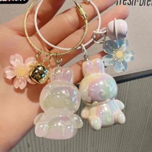 893a1030-1b44-48ab-a67e-b067e3f3d6ff.jpg Брелок "Зайчик" райдужний з аксесуарами