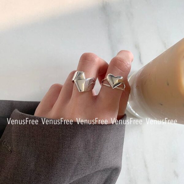 Каблучка жіноча геометрична "Серце" вигнута срібна (8119)