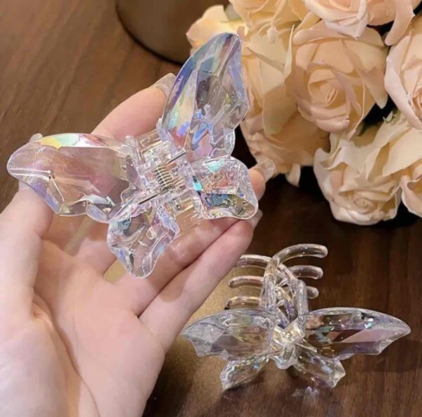 a95343fd-7e4d-4702-9bf6-2383c4a3176a.jpg Заколка-краб для волосся "Метелик" S (5*4 см) прозорий райдужний