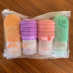 Набір дорожніх баночок 4 в 1 в косметичці силіконові складні кольорові Primark