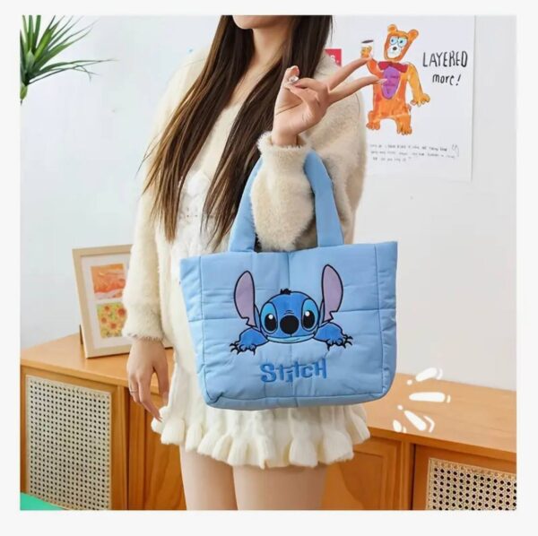 d24af953-3c3f-4fb8-b3c5-45f5f31a85ba.jpg Сумочка дитяча "Stitch" нейлонова блакитна