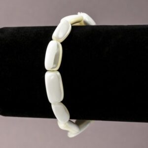 d80ed643-933f-46c8-8625-3519ef0e7164.jpg Браслет натур. Перламутр білий плоский овал 15х8 мм стрейч