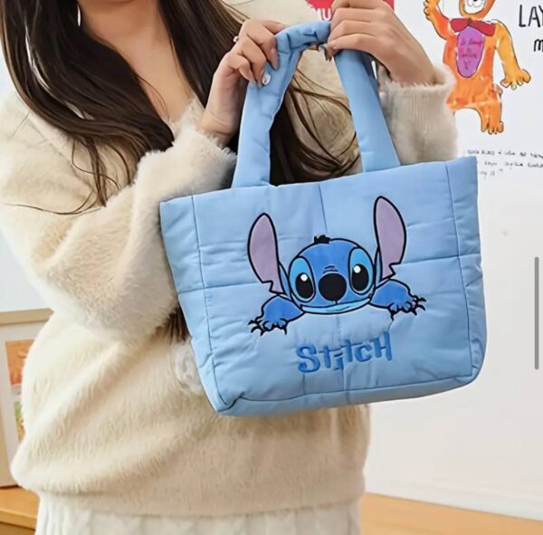 ec06870a-2bdd-41ea-becd-59cad7be5fa5.jpg Сумочка дитяча "Stitch" нейлонова блакитна