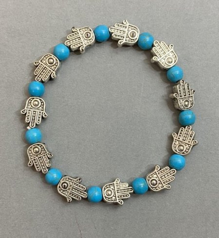 15bcafb6-584b-4a14-bf93-26d42d007a85.jpg Браслет Бірюза кулька 6 мм із вставками "Рука Фатіми" стрейч