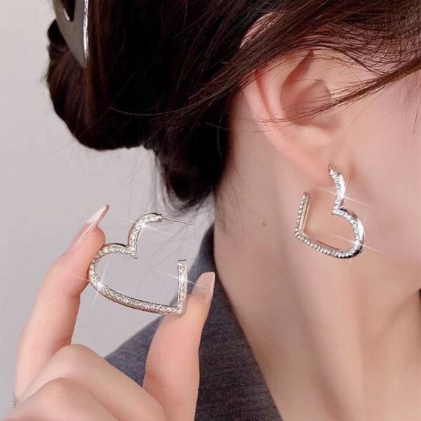 Сережки "Серце" срібні зі стразами (8205)
