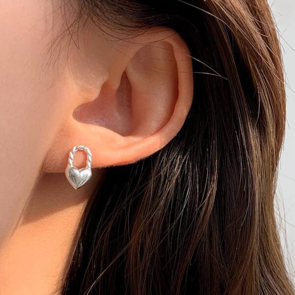 Сережки металеві "Серце-замок" срібні (10422)