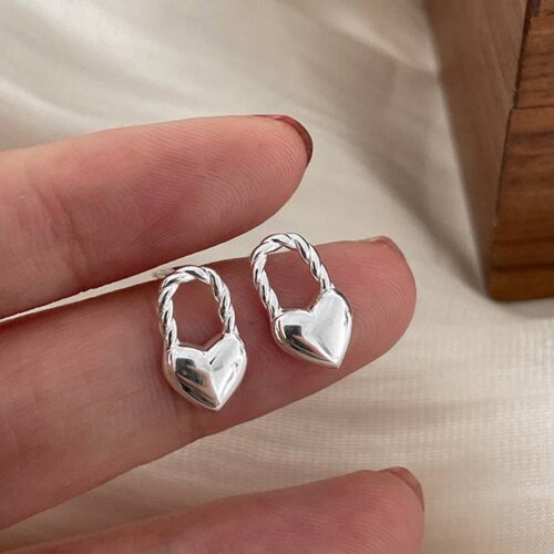 Сережки металеві "Серце-замок" срібні (10422)