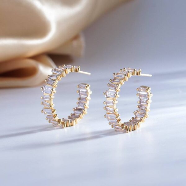 Сережки кільця золоті з прозорими камінцями (10427)