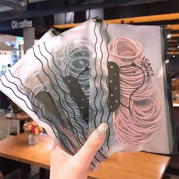 Набір гумок для волосся "I can"t swim" у пакеті на замку, 100 шт