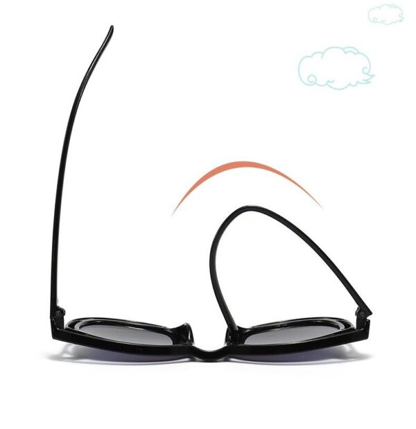 Окуляри дитячі сонцезахисні "Хамелеон" круглі в прозорій оправі (10104)