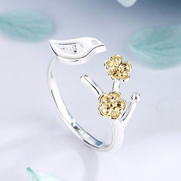 Каблучка металева "Пташка-гілочка" срібна з золотим (10489)