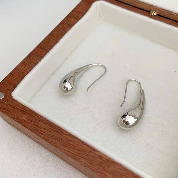 Сережки геометричні краплі дуті срібні (10682)