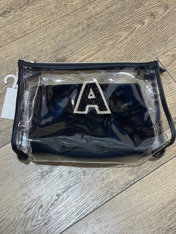 b59ec182-e188-4a63-969f-0d0b5fee47b3-1.jpg Набір косметичок "Буква" Primark прозора/ чорна велюрова