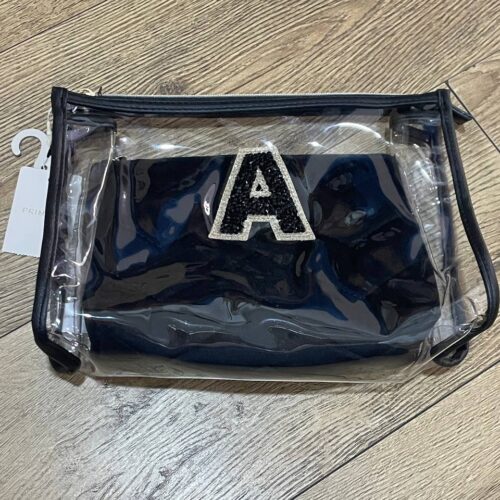 b59ec182-e188-4a63-969f-0d0b5fee47b3.jpg Набір косметичок "Буква" Primark прозора/ чорна велюрова