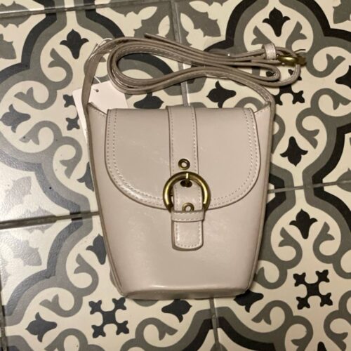 bc2f65b3-25bd-447c-8baa-0509ada7b8b8.jpg Сумочка-міні сідловидна з пряжкою через плече Primark біла