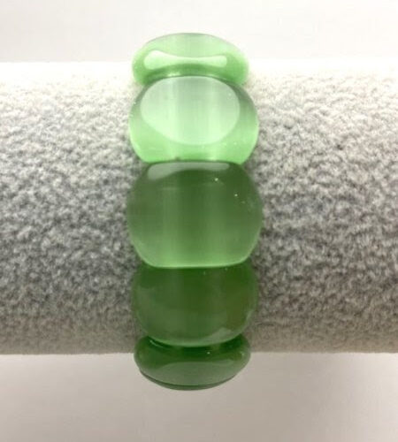 c353e999-b631-43af-ada6-9dc082410d97.jpg Браслет Котяче око зелене округла ланка 18х12 мм стрейч