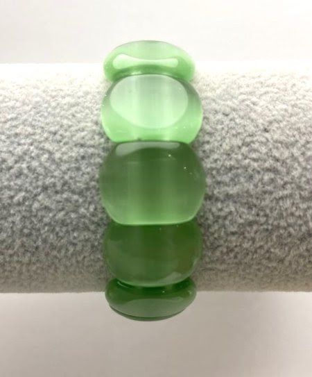 Браслет Котяче око зелене  округла ланка 18х12 мм стрейч