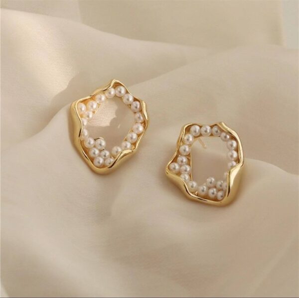 Сережки "Геометричні" кільця рельєфні з перлинами золоті (8200)