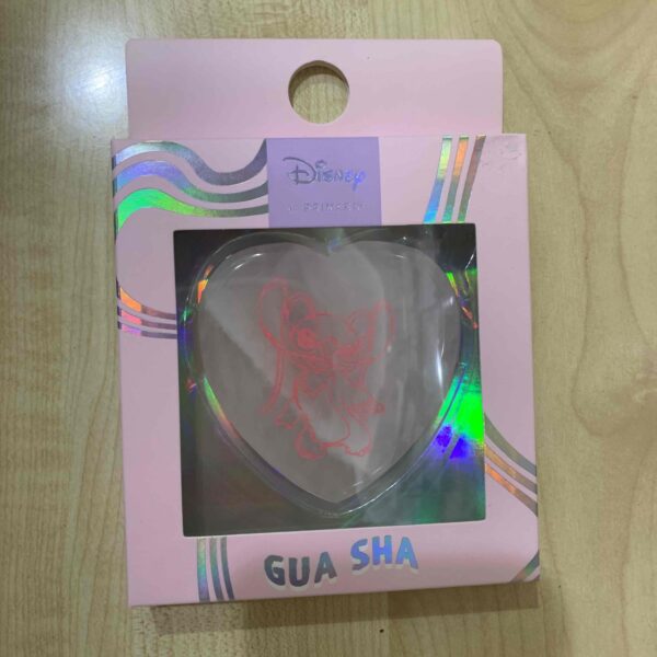 ce73980b-d9cf-4d19-82f6-061368ccb2cd-1.jpg Масажер-скребок Гуаша Primark Disney "Стітч/Stitch" Рожевий Кварц в коробці