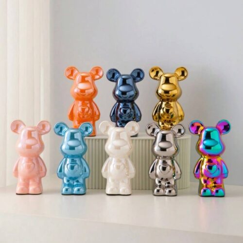 d037fa8d-3076-4bcc-bebf-7f3ff294c5ad.jpg Статуетка керамічна "Ведмедик" 18 см