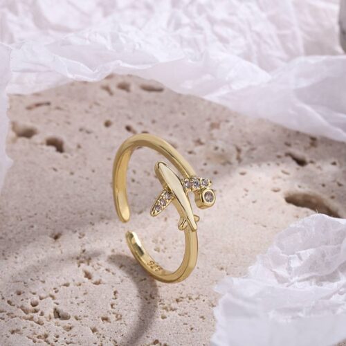 Каблучка унісекс металева "Літачок» золота (10473)