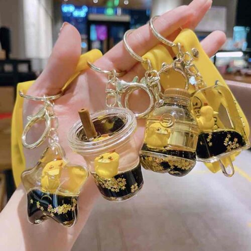 374a0106-000d-421d-9936-f200f6ae3048.jpg Брелок з рідиною "Качечка"