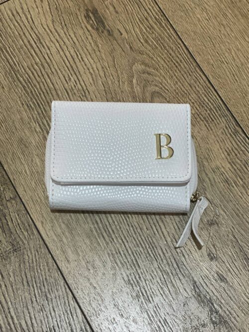 47bced1f-7221-40c2-bdc2-882181df3ad4.jpg Гаманець Primark "Буква" текстурний білий