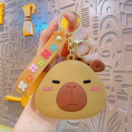 58c9f330-3cf2-4007-8bd6-38f6028d0b05.jpg Брелок-Гаманець силіконовий "Капібара"