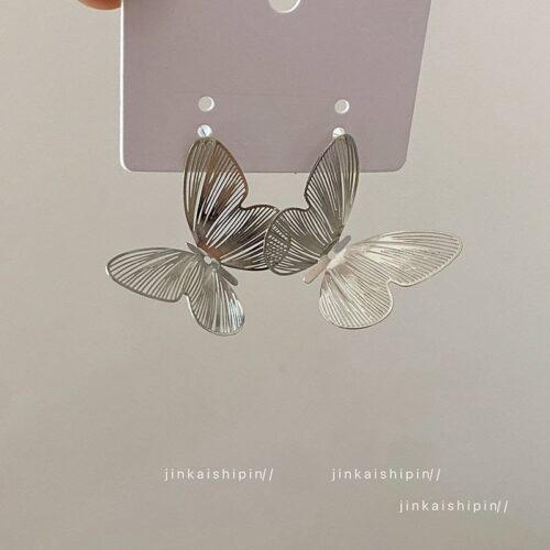 Сережки металеві "Метелик" срібні (7448)