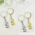 Брелок металевий "Playboy" золотий/срібний