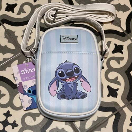 baf46ded-8aa8-41f9-b376-e8791a692bb6.jpg Сумочка для телефону/гаманець 2 в 1 "Stitch" Primark блакитна