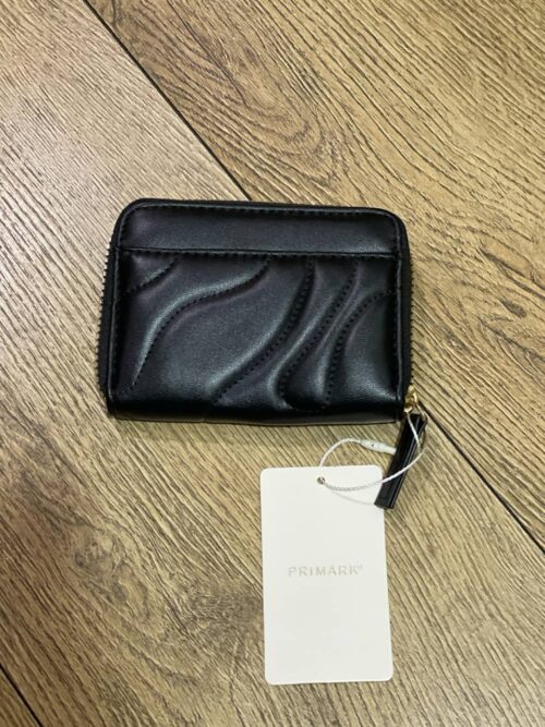 f7536b54-857f-4a5b-bbca-57908f38c497.jpg Гаманець Primark стьобаний хвилі чорний