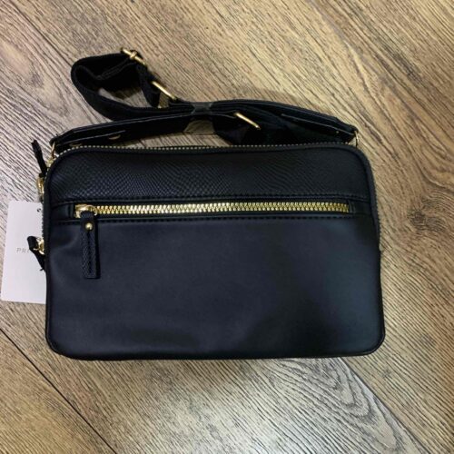 ffe70938-715d-4efb-9fe3-ada3a0cd98d9.jpg Сумочка через плече Primark з еко-шкіри з рельєфною вставкою чорна