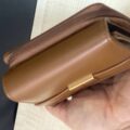Гаманець компактний Primark з золотою застібкою коричневий