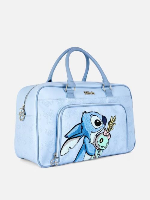 452d652d-fefe-42eb-b046-e4bbbff44984-1.jpg Сумка дорожня "Stitch" Primark з еко-шкіри блакитна